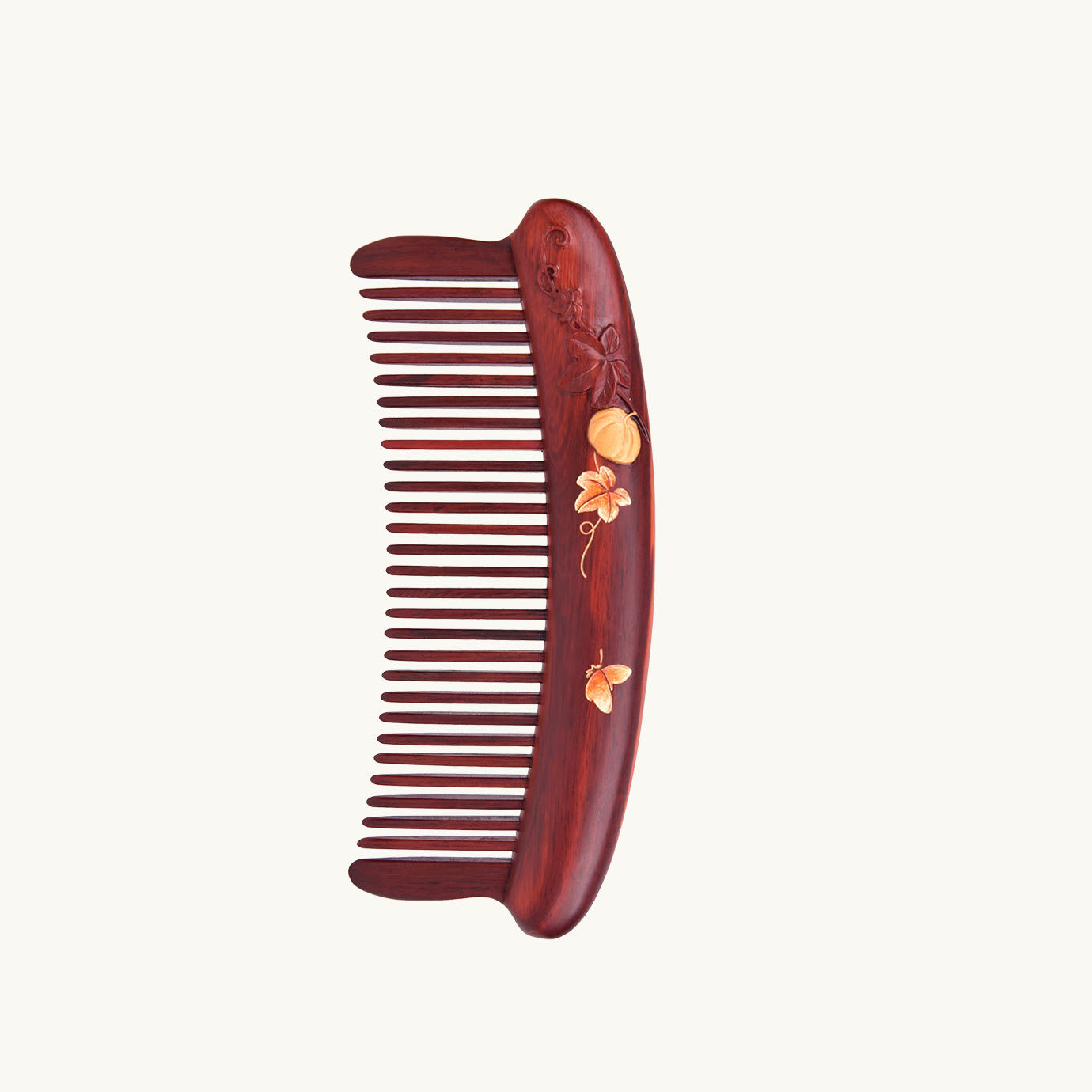 Peigne à cheveux en bois rouge (motif melon et feuille) Peigne à cheveux en bois rouge (motif melon et feuille)